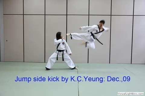 Jump side kick by K.C. Yeung